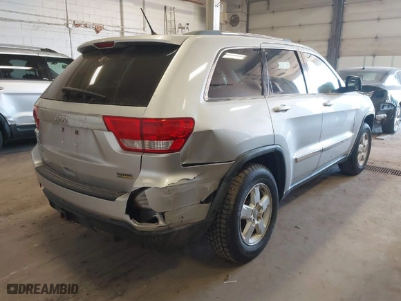 2011 Jeep Grand Cherokee Laredo with VIN 1J4RR4GG5BC690251, listed as a IAAI auction lot 41824839 with 261,010 mi miles. Bid and sale history available at carsss.com. Image 4.