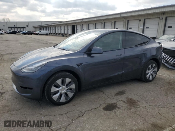 2023 Tesla Model Y Long Range with VIN 7SAYGDEE2PA024693, listed as a Copart auction lot 52595935 with 35,179 mi miles and Salvage Title. Bid and sale history available at DreamBid. Image 1.