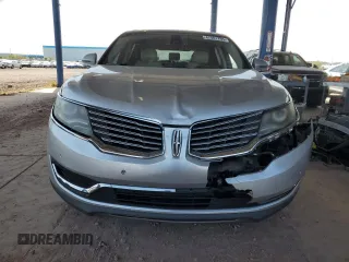 2016 Lincoln MKX Reserve z VIN 2LMTJ6LP3GBL61852, wystawiony jako Copart lot #47401795 z przebiegiem Nie podano mil oraz Szkoda całkowita • Salvage title. Historia ofert i sprzedaży dostępna na DreamBid. Obrazek 5.