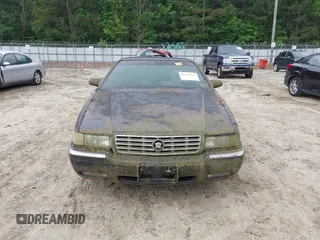 1997 Cadillac Eldorado ESC with VIN 1G6EL12Y8VU617784, listed as a IAAI auction lot 42214333 with Not Provided miles and . Bid and sale history available at DreamBid. Image 6.