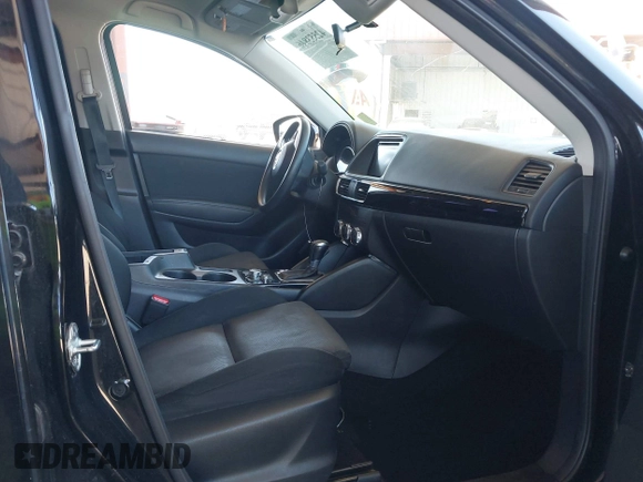 2016 Mazda CX-5 Sport with VIN JM3KE4BY8G0829002, listed as a IAAI auction lot 42553846 with 103,231 mi miles and . Bid and sale history available at DreamBid. Image 5.