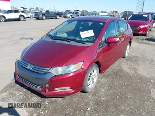 2010 Honda Insight EX z VIN JHMZE2H75AS033702, wystawiony jako IAAI lot #42027147 z przebiegiem 173 388 mil mil oraz . Historia ofert i sprzedaży dostępna na DreamBid. Obrazek 6.