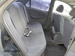 2000 Hyundai Elantra GLS z VIN KMHJF35F9YU032902, wystawiony jako Copart lot #45145955 z przebiegiem 79 229 mil mil oraz Czysty tytuł • Clean title. Historia ofert i sprzedaży dostępna na DreamBid. Obrazek 10.
