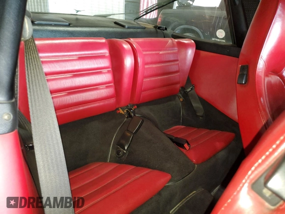 1988 Porsche 911 z VIN WP0EB0913JS161203, wystawiony jako Copart lot #71547754 z przebiegiem 109 128 mil mil oraz Szkoda całkowita • Salvage title. Historia ofert i sprzedaży dostępna na DreamBid. Obrazek 10.