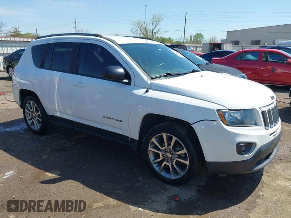2016 Jeep Compass Sport z VIN 1C4NJCBAXGD806456, wystawiony jako IAAI lot #41967561 z przebiegiem 125 305 mil mil oraz . Historia ofert i sprzedaży dostępna na DreamBid. Obrazek 1.