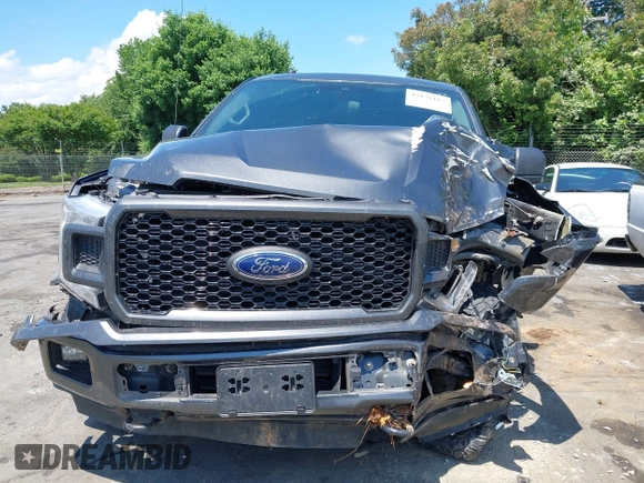 2019 Ford F-150 XL with VIN 1FTEW1EP7KFC28853, listed as a IAAI auction lot 42176182 with 132,599 mi miles and . Bid and sale history available at DreamBid. Image 12.