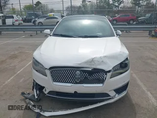 2017 Lincoln MKZ Reserve z VIN 3LN6L5EC2HR613827, wystawiony jako IAAI lot #41800613 z przebiegiem 199 097 mil mil oraz . Historia ofert i sprzedaży dostępna na DreamBid. Obrazek 12.