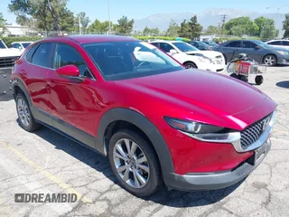2021 Mazda CX-30 Select with VIN 3MVDMABL7MM243857, listed as a IAAI auction lot 42642920 with 82,121 mi miles and . Bid and sale history available at DreamBid. Image 1.