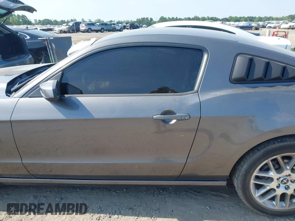 2014 Ford Mustang V6 with VIN 1ZVBP8AM3E5225590, listed as a IAAI auction lot 42148999 with 94,911 mi miles and . Bid and sale history available at DreamBid. Image 14.