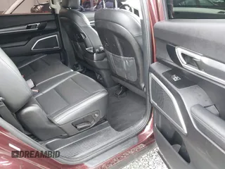 2021 Kia Telluride LX z VIN 5XYP24HC8MG146502, wystawiony jako IAAI lot #41936276 z przebiegiem 94 820 mil mil oraz . Historia ofert i sprzedaży dostępna na DreamBid. Obrazek 8.