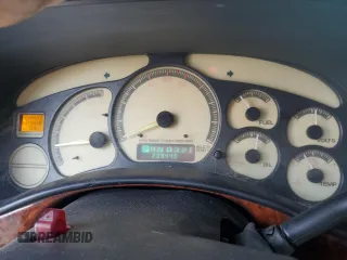 2001 GMC Yukon SLT z VIN 1GKEC13T51J117159, wystawiony jako Copart lot #55241255 z przebiegiem 209 440 mil mil oraz Szkoda całkowita • Salvage title. Historia ofert i sprzedaży dostępna na DreamBid. Obrazek 9.