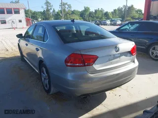 2012 Volkswagen Passat SE with VIN 1VWBH7A38CC066959, listed as a IAAI auction lot 41947804 with 171,738 mi miles. Bid and sale history available at carsss.com. Image 3.