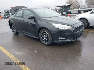 2015 Ford Focus SE with VIN 1FADP3F22FL240476, listed as a IAAI auction lot 41739722 with 159,179 mi miles. Bid and sale history available at carsss.com. Image 1.