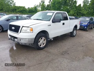 2004 Ford F-150 XLT with VIN 1FTPX14504NC73289, listed as a IAAI auction lot 42296163 with 193,363 mi miles and . Bid and sale history available at DreamBid. Image 2.