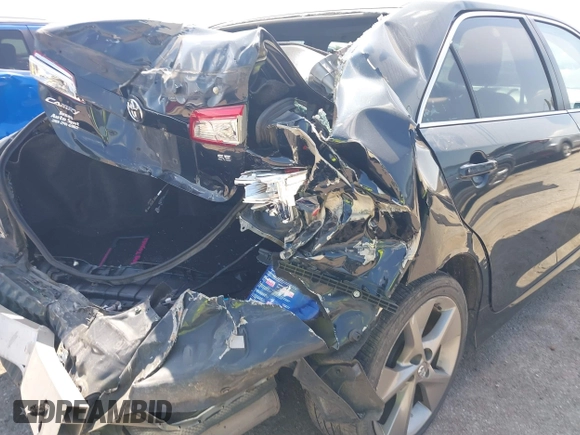 2014 Toyota Camry L with VIN 4T1BF1FK2EU817293, listed as a IAAI auction lot 41882906 with 189,719 mi miles. Bid and sale history available at carsss.com. Image 6.