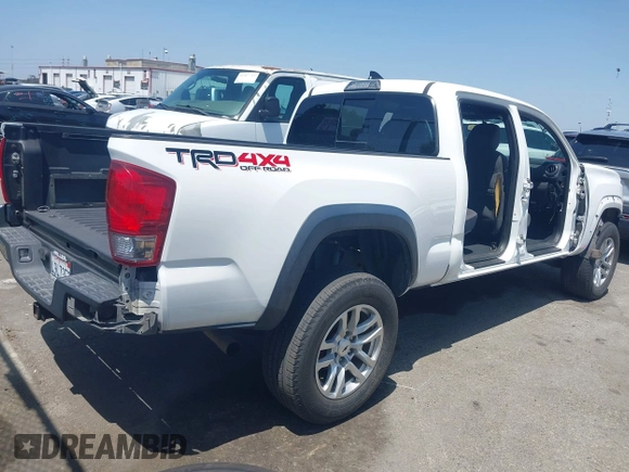 2017 Toyota Tacoma SR5 with VIN 3TMDZ5BN5HM021139, listed as a IAAI auction lot 42555465 with 139,782 mi miles and . Bid and sale history available at DreamBid. Image 4.