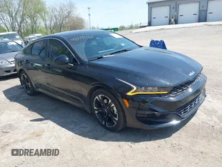 2022 Kia K5 GT-Line z VIN 5XXG64J25NG143665, wystawiony jako IAAI lot #42091161 z przebiegiem 55 628 mil mil oraz . Historia ofert i sprzedaży dostępna na DreamBid. Obrazek 1.