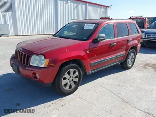 2006 Jeep Grand Cherokee Laredo with VIN 1J4HR48N56C112794, listed as a IAAI auction lot 42008002 with 207,065 mi miles. Bid and sale history available at carsss.com. Image 2.