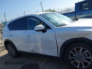 2022 Mazda CX-5 S Preferred with VIN JM3KFBCM2N0630148, listed as a IAAI auction lot 41986351 with 45,664 mi miles and . Bid and sale history available at carsss.com. Image 13.