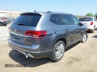 2019 Volkswagen Atlas SEL z VIN 1V2ER2CA5KC555568, wystawiony jako IAAI lot #42050516 z przebiegiem 71 599 mil mil oraz . Historia ofert i sprzedaży dostępna na DreamBid. Obrazek 4.