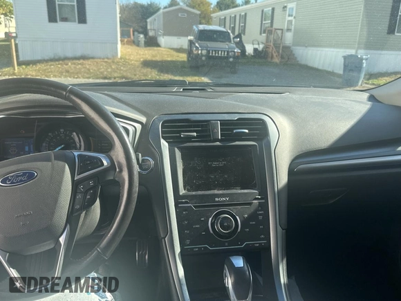2015 Ford Fusion Energi Titanium with VIN 3FA6P0SU8FR284661, listed as a Copart auction lot 78322934 with 151,859 mi miles and Clean Title. Bid and sale history available at carsss.com. Image 9.