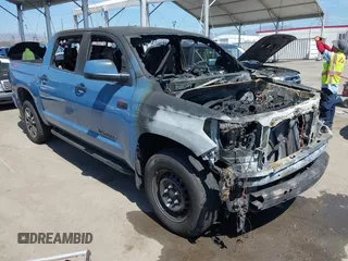 2021 Toyota Tundra SR5 with VIN 5TFDY5F14MX980045, listed as a IAAI auction lot 41880725 with Not provided miles and . Bid and sale history available at DreamBid. Image 1.