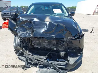 2018 Mazda CX-5 Touring z VIN JM3KFACM3J1339074, wystawiony jako IAAI lot #42317039 z przebiegiem 82 799 mil mil oraz . Historia ofert i sprzedaży dostępna na DreamBid. Obrazek 6.