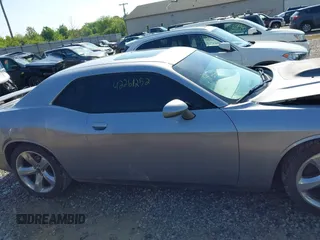 2014 Dodge Challenger R/T z VIN 2C3CDYBT9EH139932, wystawiony jako IAAI lot #42261252 z przebiegiem 95 241 mil mil oraz . Historia ofert i sprzedaży dostępna na DreamBid. Obrazek 14.
