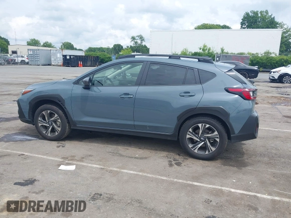 2024 Subaru Crosstrek Premium z VIN JF2GUADC7R8299418, wystawiony jako IAAI lot #42358005 z przebiegiem 21 690 mil mil oraz . Historia ofert i sprzedaży dostępna na DreamBid. Obrazek 14.
