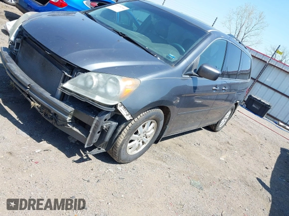 2010 Honda Odyssey EX-L with VIN 5FNRL3H7XAB061280, listed as a IAAI auction lot 41979790 with 245,386 mi miles. Bid and sale history available at carsss.com. Image 2.