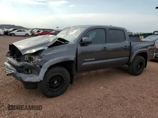 2018 Toyota Tacoma SR5 с VIN 3TMAZ5CN7JM062718, выставлен на аукционе Copart как лот 65046625 с пробегом 50 899 миль миль и Списание • Salvage title. История ставок и продаж доступна на DreamBid. Изображение 1.