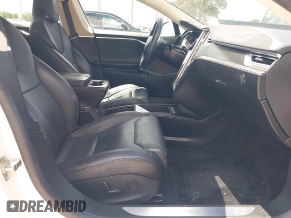 2017 Tesla Model S 100D with VIN 5YJSA1E45HF189006, listed as a IAAI auction lot 42540693 with 64,827 mi miles and . Bid and sale history available at DreamBid. Image 5.