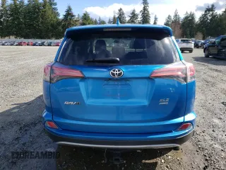 2018 Toyota RAV4 XLE with VIN 2T3RFREV3JW752934, listed as a Copart auction lot 48942015 with 74,182 mi miles and Salvage Title. Bid and sale history available at DreamBid. Image 6.
