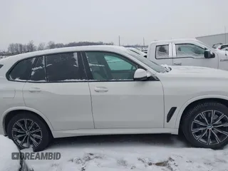 2020 BMW X5 M50i with VIN 5UXJU4C09LLE45658, listed as a IAAI auction lot 41307154 with 69,936 mi miles and . Bid and sale history available at DreamBid. Image 13.