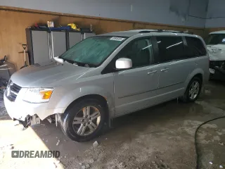 2010 Dodge Grand Caravan Crew with VIN 2D4RN6DX9AR390514, listed as a Copart auction lot 50906305 with 102,729 mi miles and Clean Title. Bid and sale history available at DreamBid. Image 1.