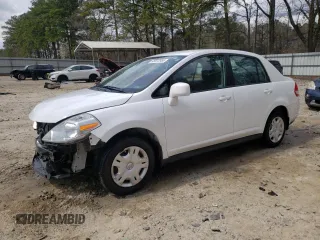 2010 Nissan Versa S with VIN 3N1BC1AP1AL394858, listed as a Copart auction lot 48072955 with 120,265 mi miles and Salvage title. Bid and sale history available at DreamBid. Image 1.
