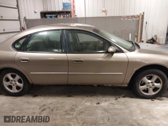 2003 Ford Taurus SES Standard with VIN 1FAFP552X3G184894, listed as a IAAI auction lot 41846677 with 160,824 mi miles. Bid and sale history available at carsss.com. Image 13.