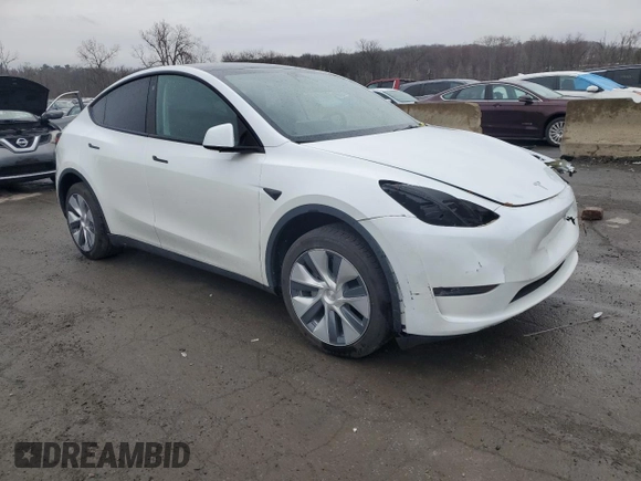 2023 Tesla Model Y Long Range with VIN 7SAYGDEEXPA122953, listed as a Copart auction lot 52627095 with Not Provided miles and Salvage Title. Bid and sale history available at DreamBid. Image 4.