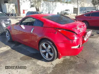 2007 Nissan 350Z Touring with VIN JN1BZ34E87M550297, listed as a IAAI auction lot 41993683 with 127,973 mi miles. Bid and sale history available at carsss.com. Image 3.