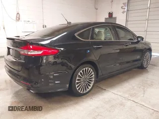 2017 Ford Fusion Titanium with VIN 3FA6P0SUXHR208653, listed as a IAAI auction lot 41312067 with 62,601 mi miles and . Bid and sale history available at DreamBid. Image 4.