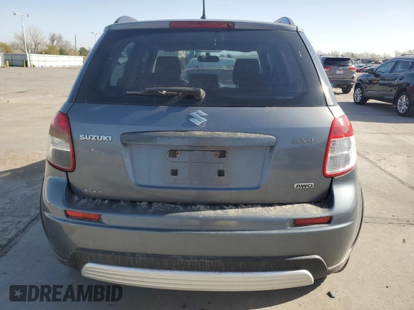 2009 Suzuki SX4 AWD z VIN JS2YB413895101919, wystawiony jako Copart lot #52235635 z przebiegiem 193 065 mil mil oraz Czysty tytuł • Clean title. Historia ofert i sprzedaży dostępna na DreamBid. Obrazek 6.