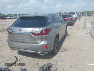 2019 Lexus RX 350 z VIN 2T2ZZMCA3KC123630, wystawiony jako IAAI lot #42436711 z przebiegiem 63 989 mil mil oraz . Historia ofert i sprzedaży dostępna na DreamBid. Obrazek 4.