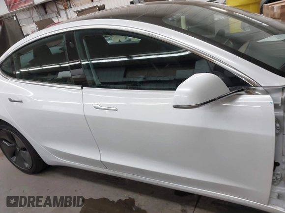 2020 Tesla Model 3 Standard Range Plus with VIN 5YJ3E1EA7LF805828, listed as a IAAI auction lot 41841505 with 44,946 mi miles and . Bid and sale history available at DreamBid. Image 14.