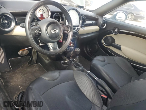2012 MINI Coupe S z VIN WMWSX3C58CT465767, wystawiony jako Copart lot #88276985 z przebiegiem 113 023 mil mil oraz Szkoda całkowita • Salvage title. Historia ofert i sprzedaży dostępna na DreamBid. Obrazek 8.
