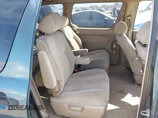 1998 Toyota Sienna LE with VIN 4T3ZF13CXWU049115, listed as a IAAI auction lot 42193159 with 194,313 mi miles and . Bid and sale history available at DreamBid. Image 8.