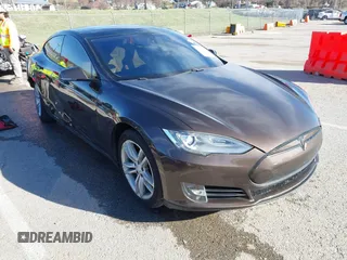 2014 Tesla Model S 60 with VIN 5YJSA1H17EFP33275, listed as a IAAI auction lot 41778167 with 202,749 mi miles and . Bid and sale history available at DreamBid. Image 1.