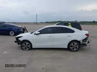 2021 Kia Forte LXS with VIN 3KPF24AD0ME361786, listed as a IAAI auction lot 42427196 with 60,013 mi miles and . Bid and sale history available at DreamBid. Image 13.