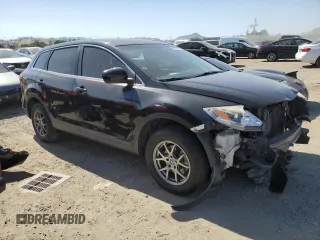 2014 Mazda CX-9 Touring with VIN JM3TB3CA7E0429194, listed as a Copart auction lot 58377965 with 129,101 mi miles and Salvage title. Bid and sale history available at DreamBid. Image 4.