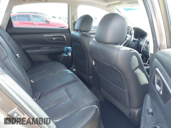 2014 Nissan Altima SL with VIN 1N4BL3AP9EC284477, listed as a IAAI auction lot 41403427 with 100,437 mi miles and . Bid and sale history available at DreamBid. Image 8.