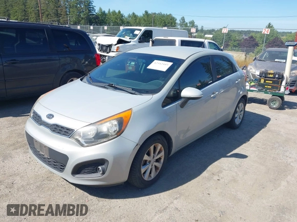 2013 Kia Rio SX with VIN KNADN5A32D6120598, listed as a IAAI auction lot 42342103 with 121,081 mi miles and . Bid and sale history available at DreamBid. Image 2.